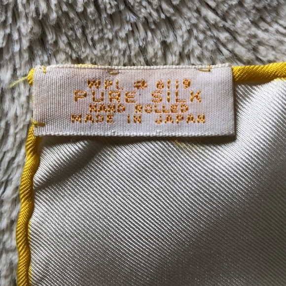 Vintage Schiaparelli silk scarf hand-rolled